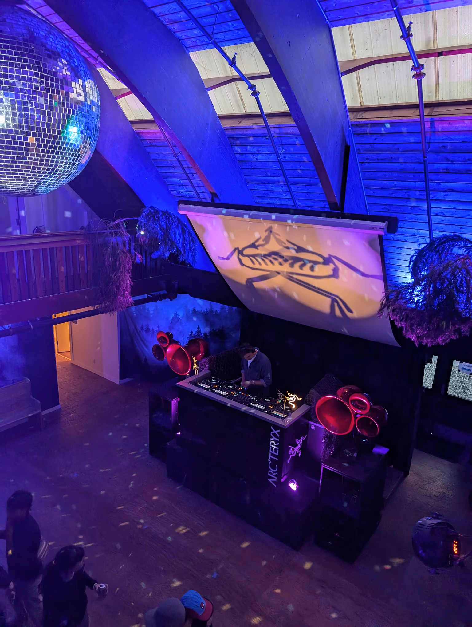 At the controls, facing the crowd