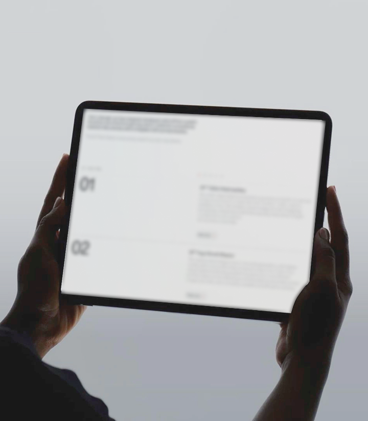 Founder reviewing an acquisition plan on a tablet