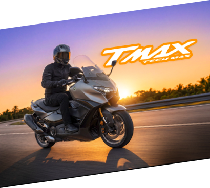Rider on a Yamaha TMAX at sunset