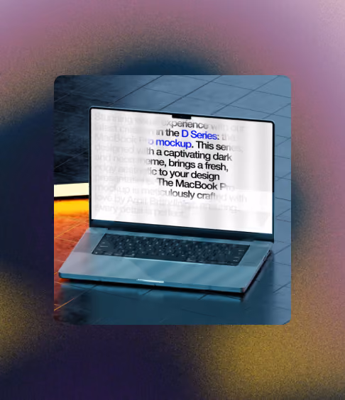 Open laptop on floor with a blurred white screen showing partially legible text.