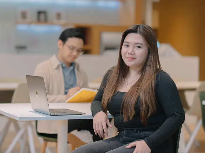  Male professional working at a desk, representing a positive candidate experience during the hiring journey