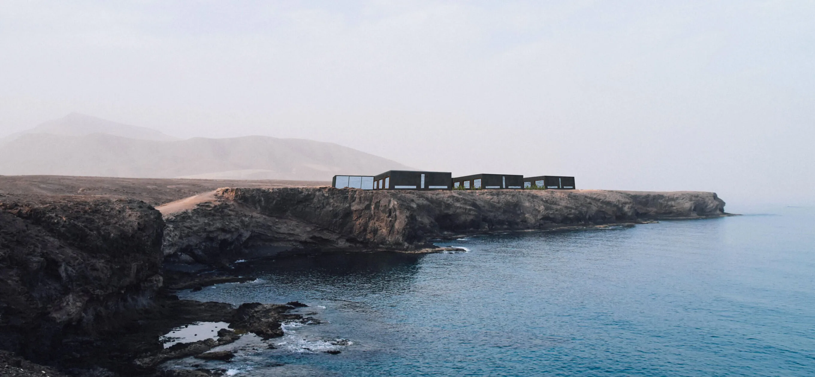 Minimalist luxury architecture villa built on a rugged cliffside overlooking the Mediterranean sea in Ibiza - Project Esperanza.