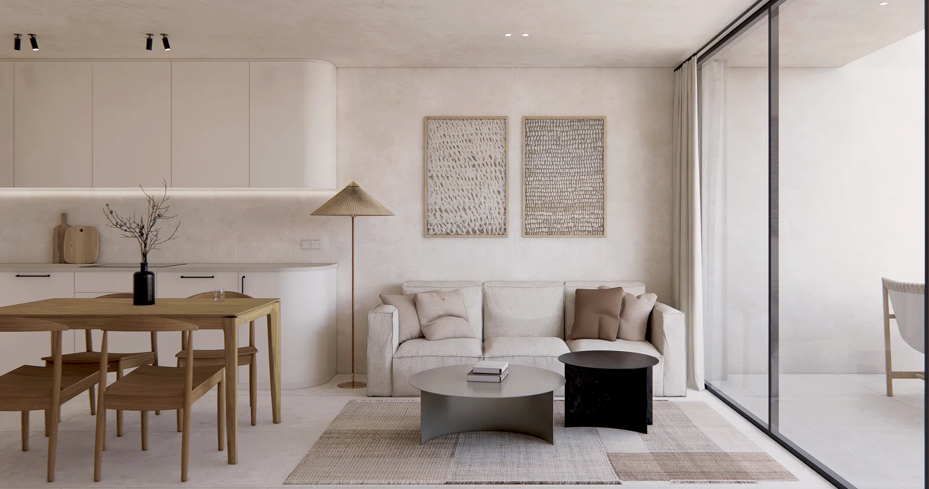 Open-plan luxury interior design at Can Lantana, featuring a neutral corner sofa, wooden dining chairs, and a minimalist kitchen layout in Ibiza.
