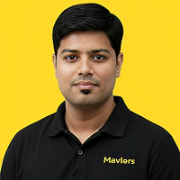 Man with short black hair wearing a black polo shirt with 'Mavlers' text on a yellow background.