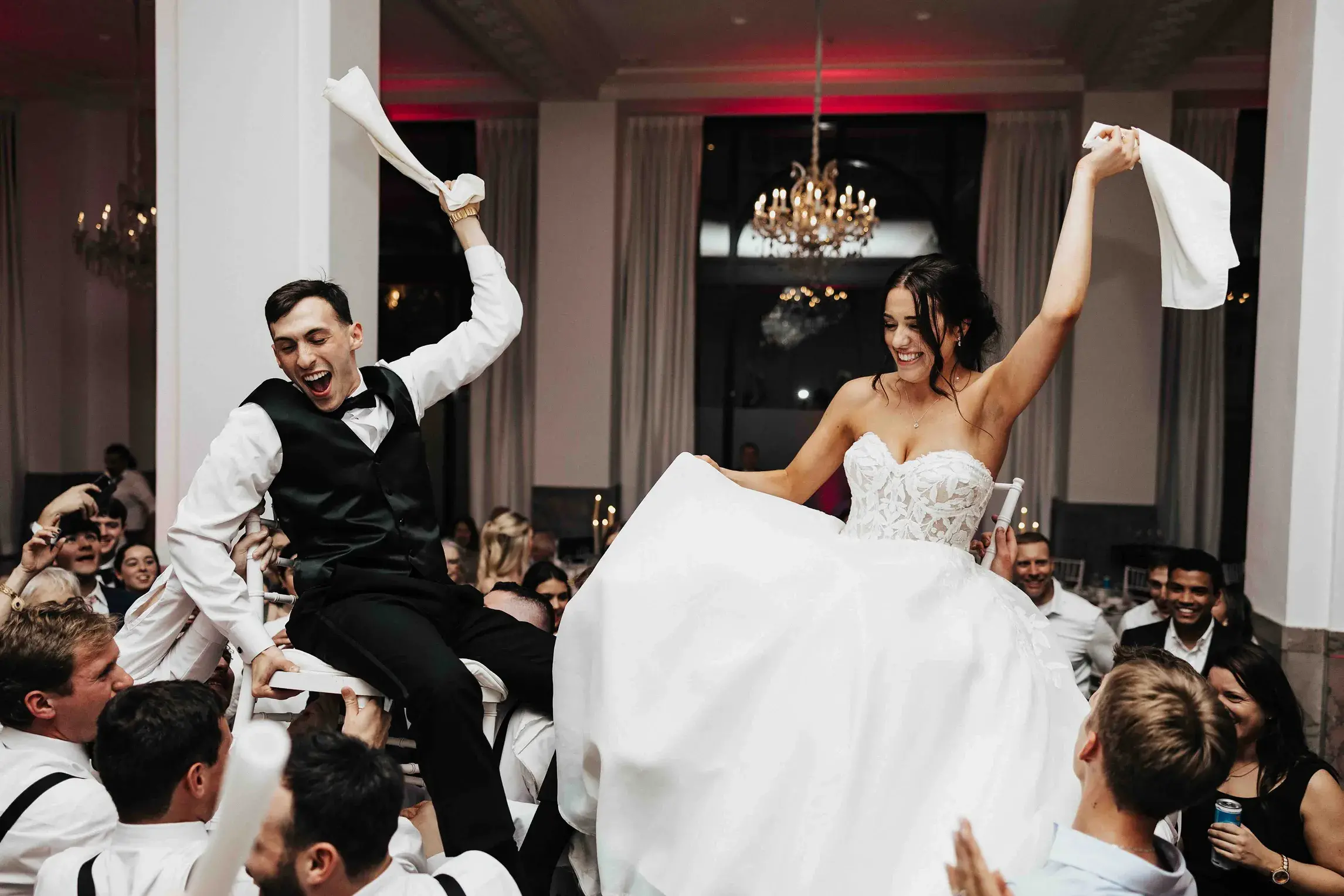 Wedding couple dancing and celebrating with guests at a wedding reception in Providence, Rhode Island.