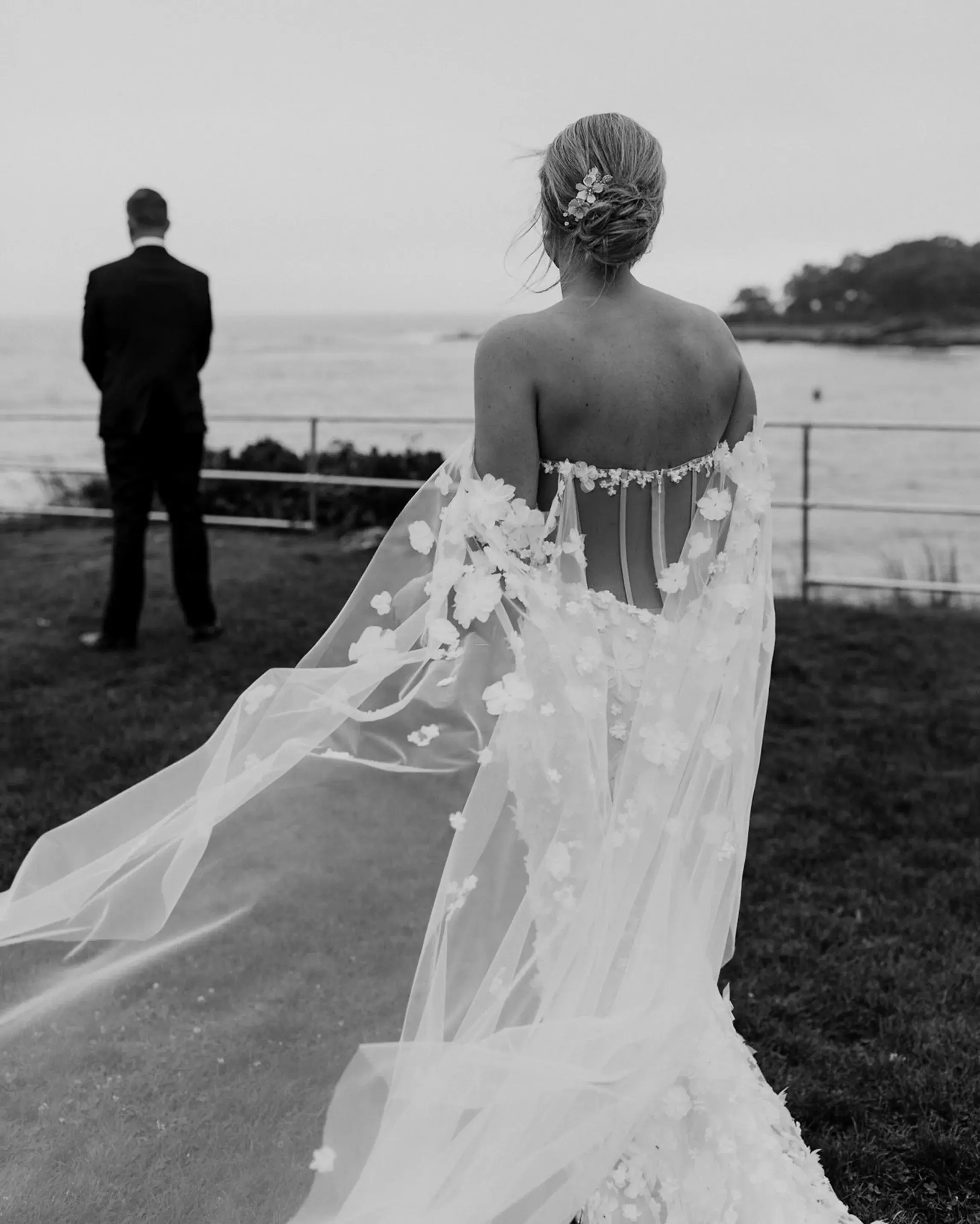 Bride waiting for her first look with the groom at Stage Neck Inn, overlooking the Maine coast on their wedding day.
