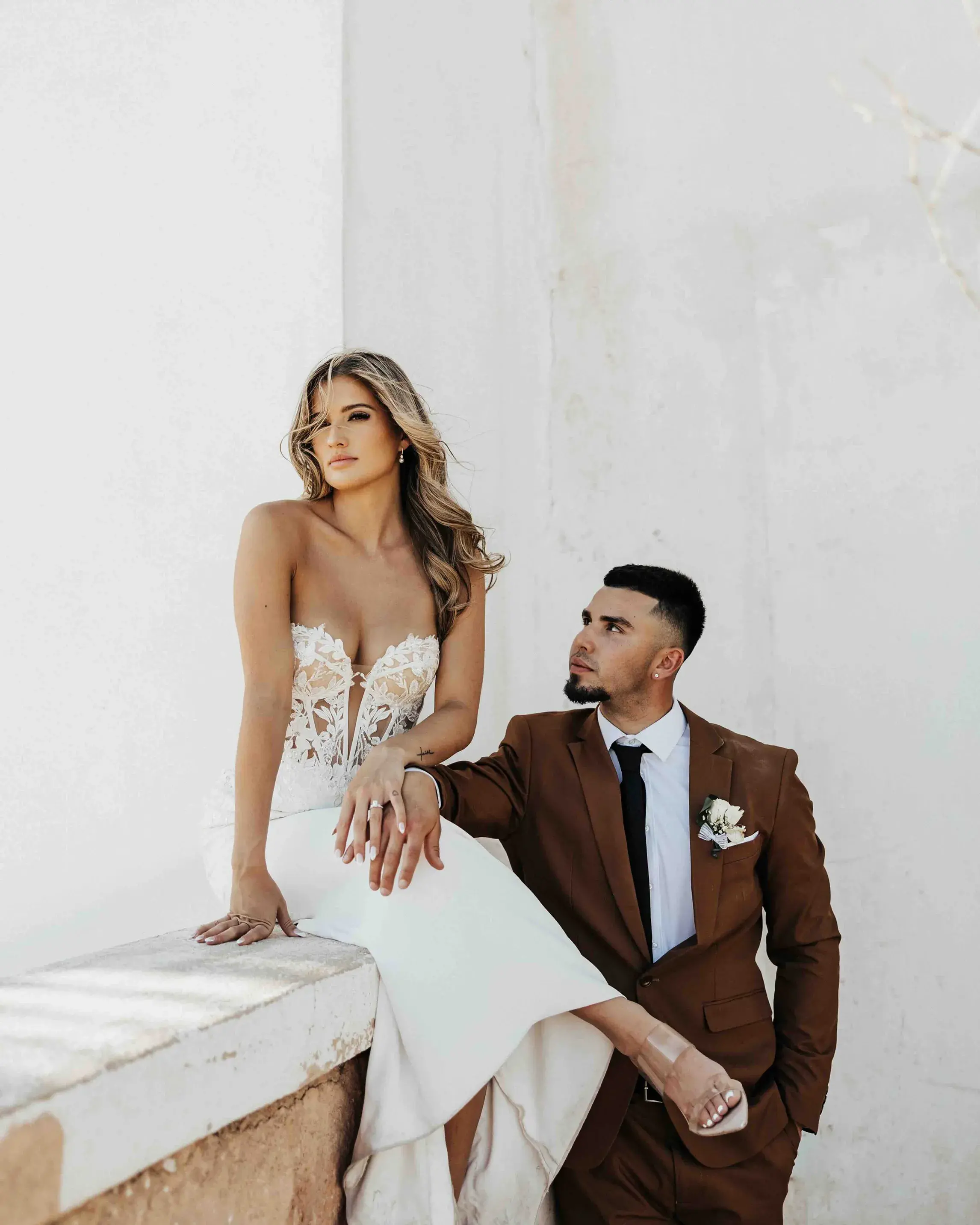 Bride and groom posing together during an intimate elopement wedding in Arizona.