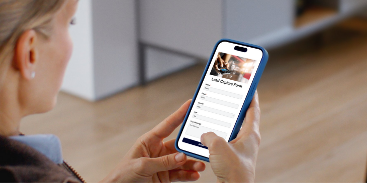 Woman filling out lead capture form on smartphone