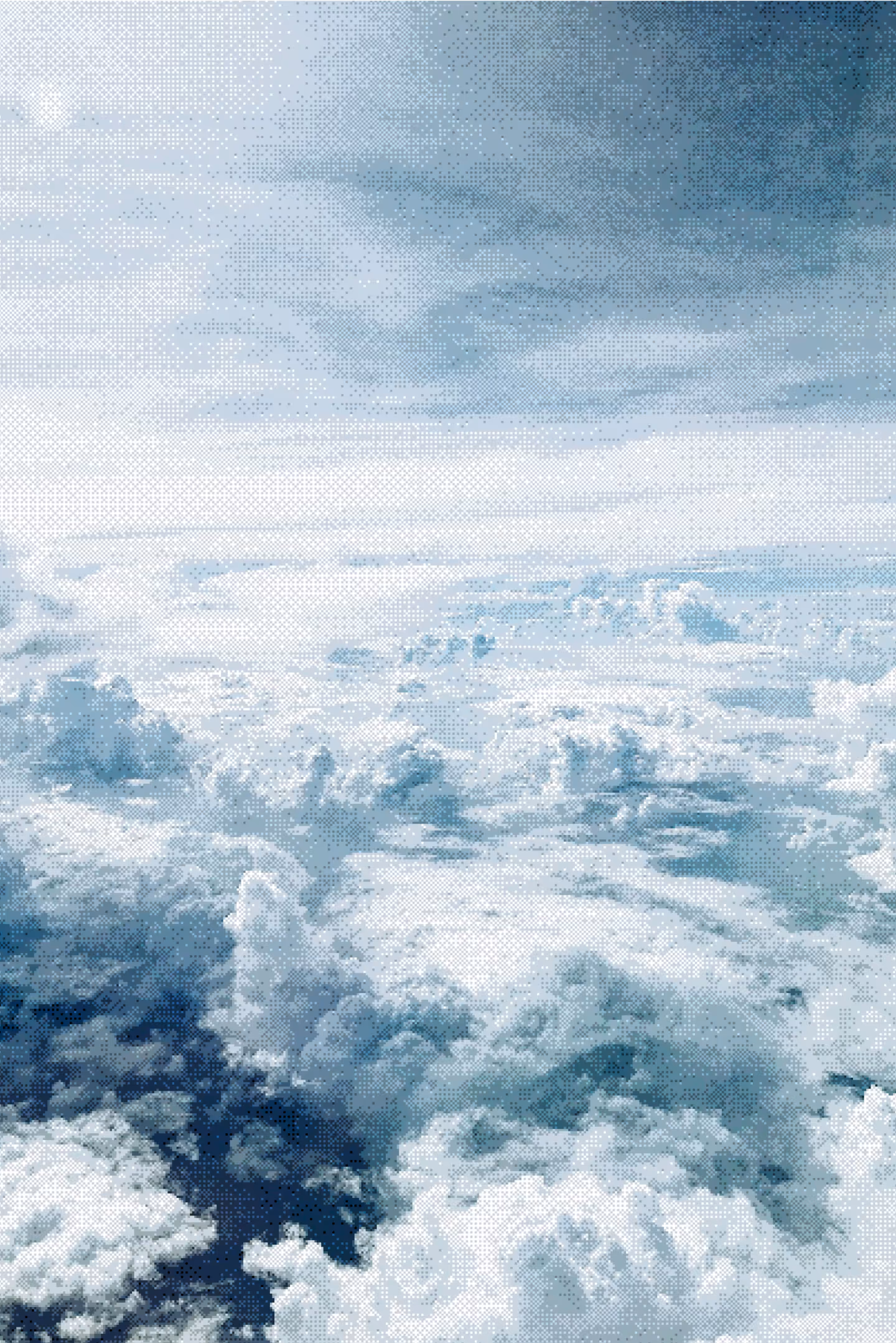 Aerial view of fluffy white clouds under a partly cloudy sky with patches of blue.