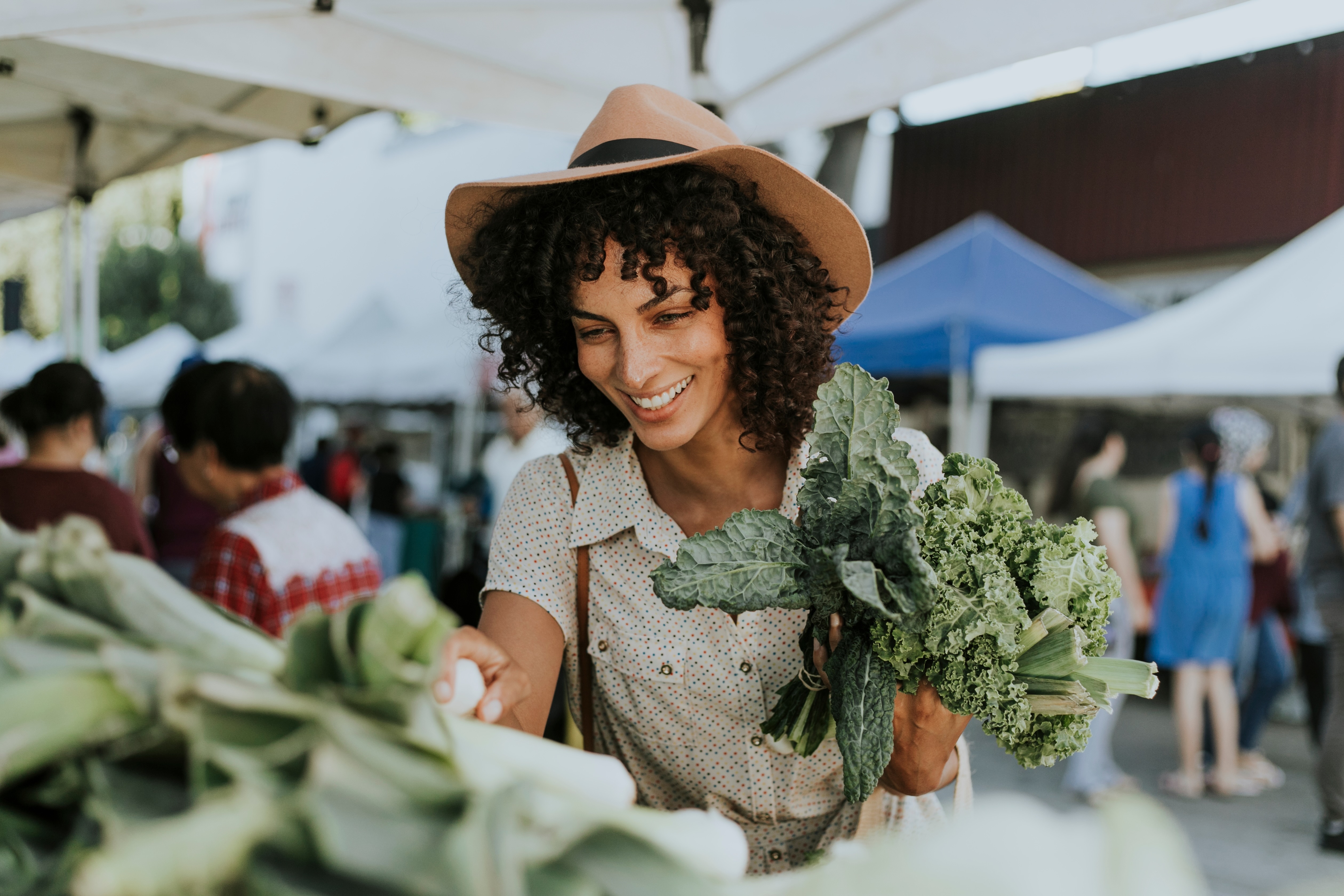 Woman at farmers market stock photo