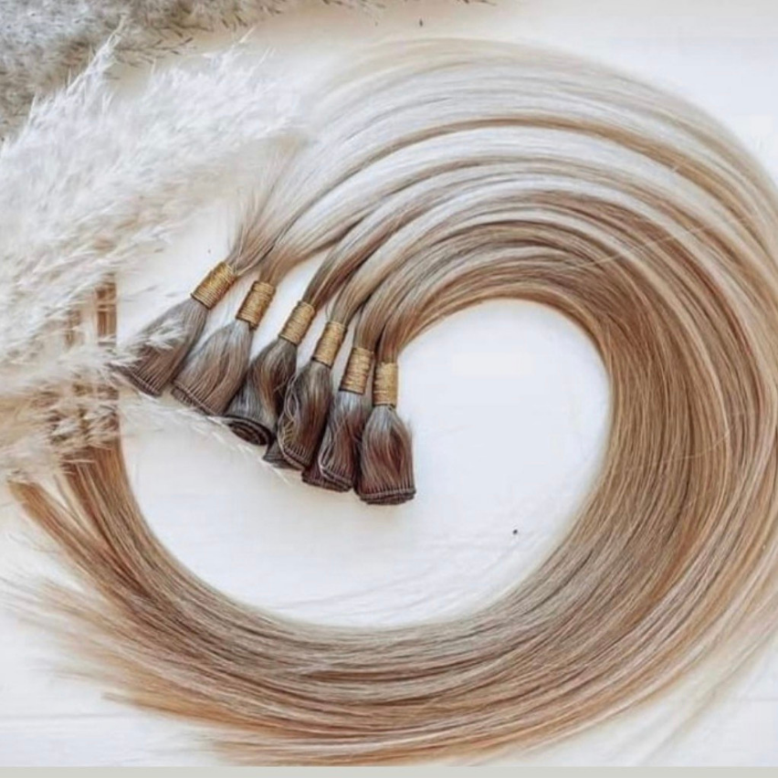 Hair extension application at Joan & Co. in Mankato, MN