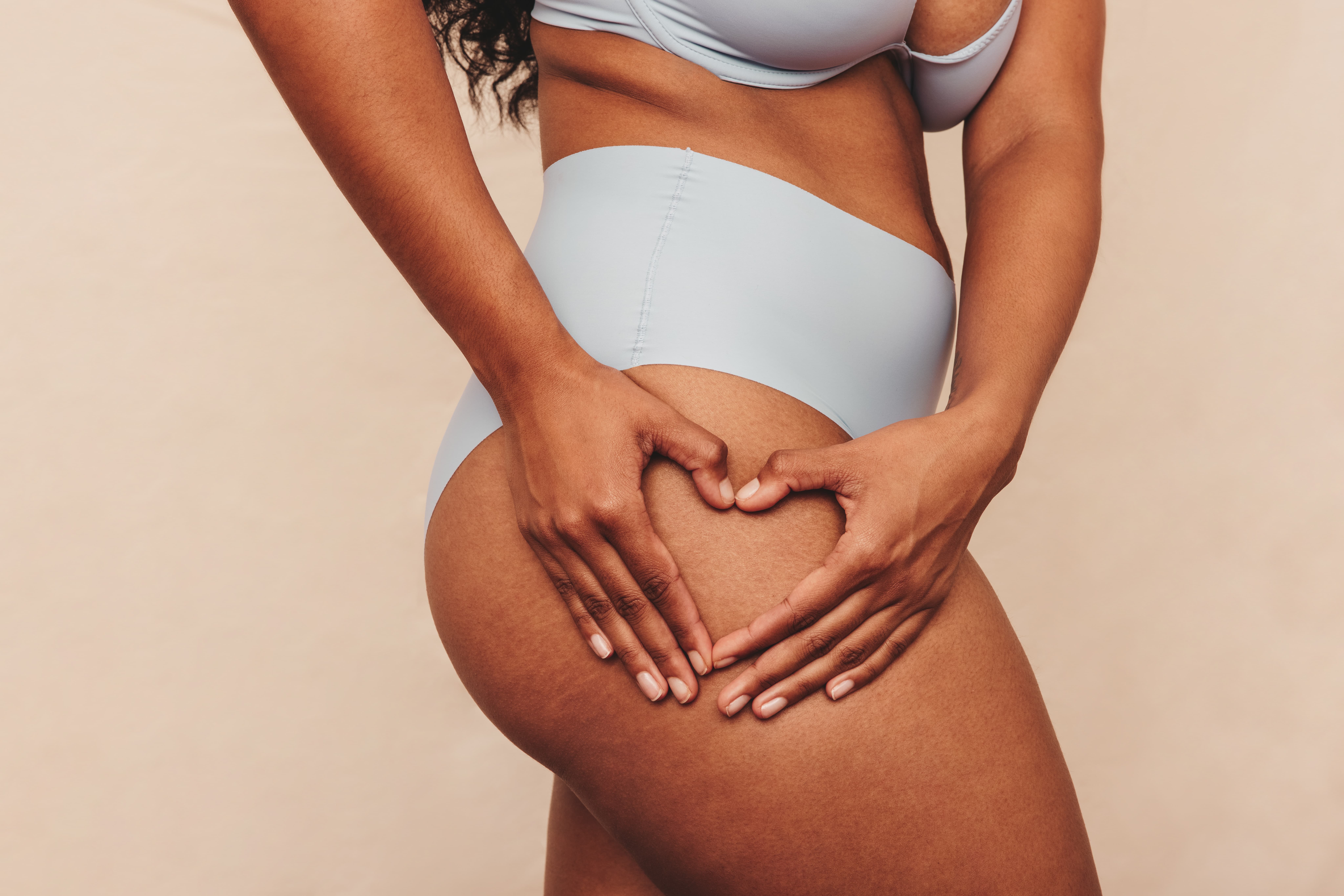 Woman receiving a non-surgical Ultimate Contour body contouring treatment at Healthy Living Medical in Texarkana, TX