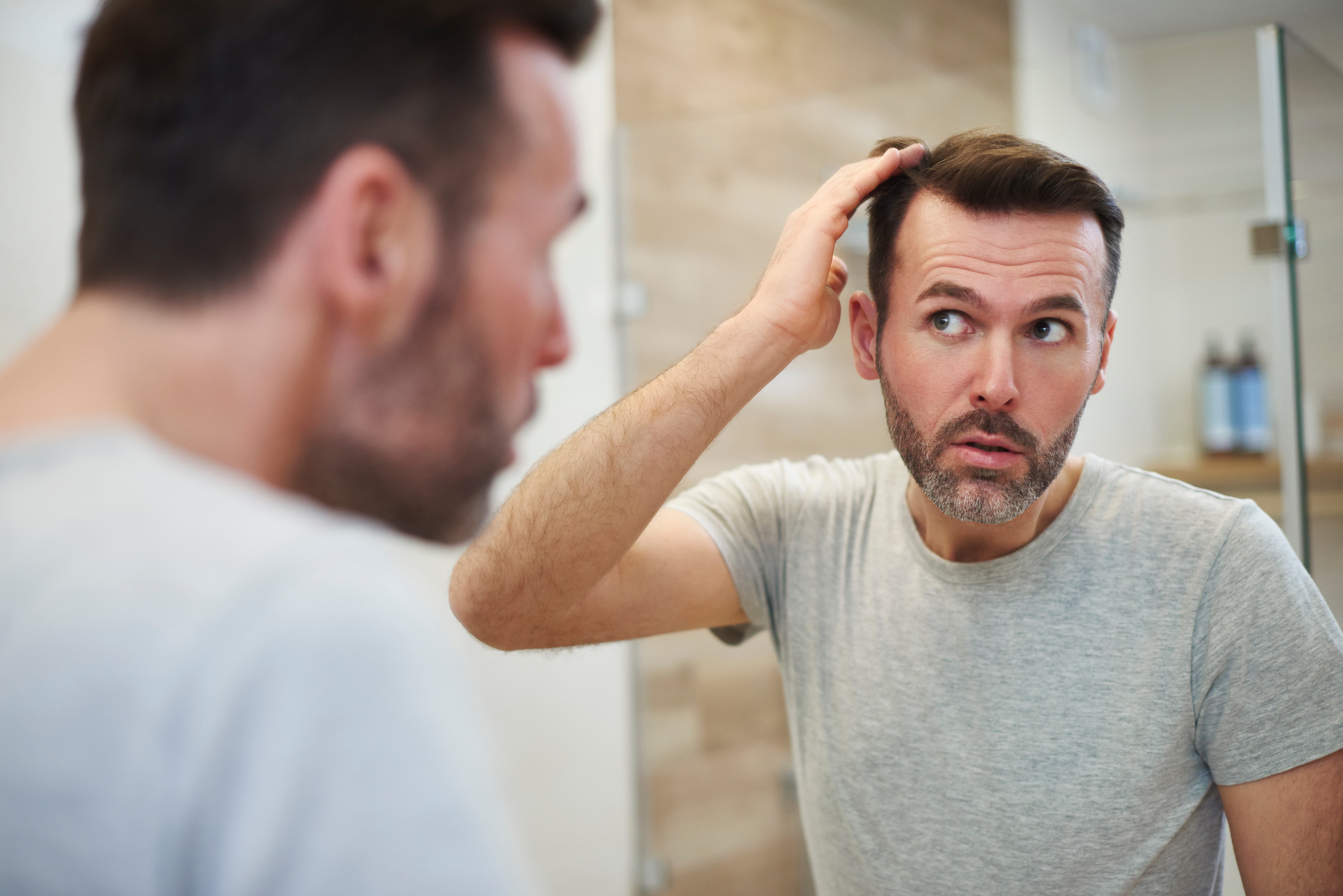 Needle-free TED hair restoration treatment being performed at Healthy Living Medical in Texarkana, TX