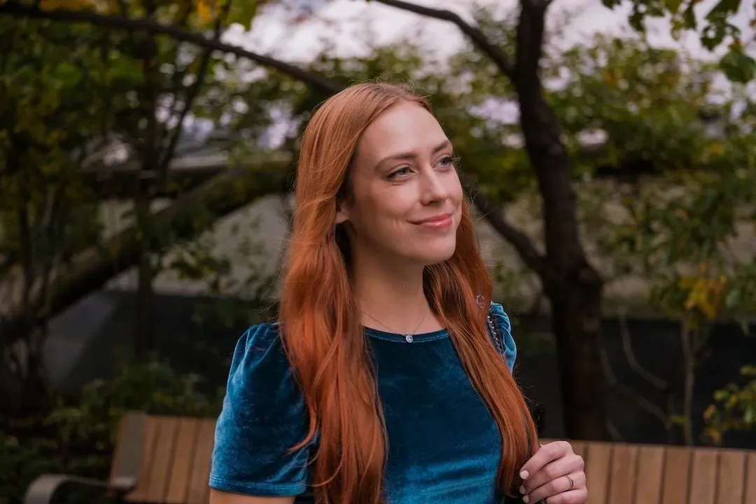 Female smiling, walking