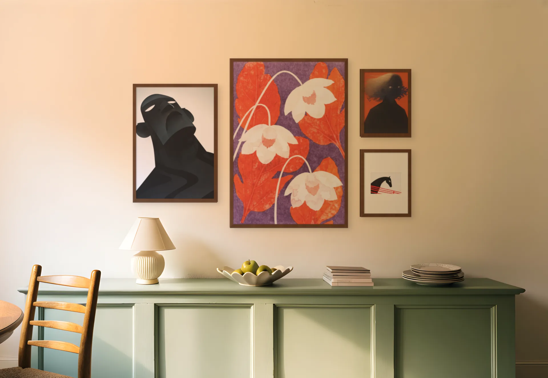 Moody gallery wall template: four framed prints, the largest in the middle, above a sideboard in a kitchen-diner