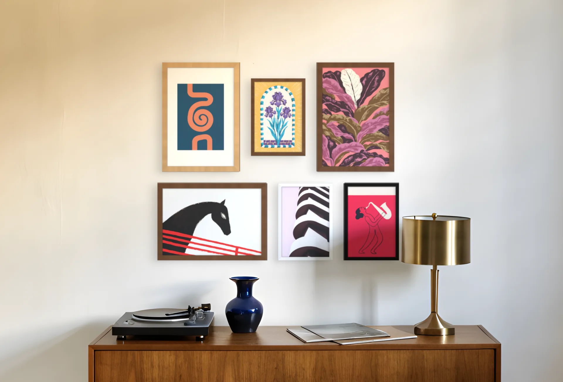 Six framed prints in two rows above a sideboard.