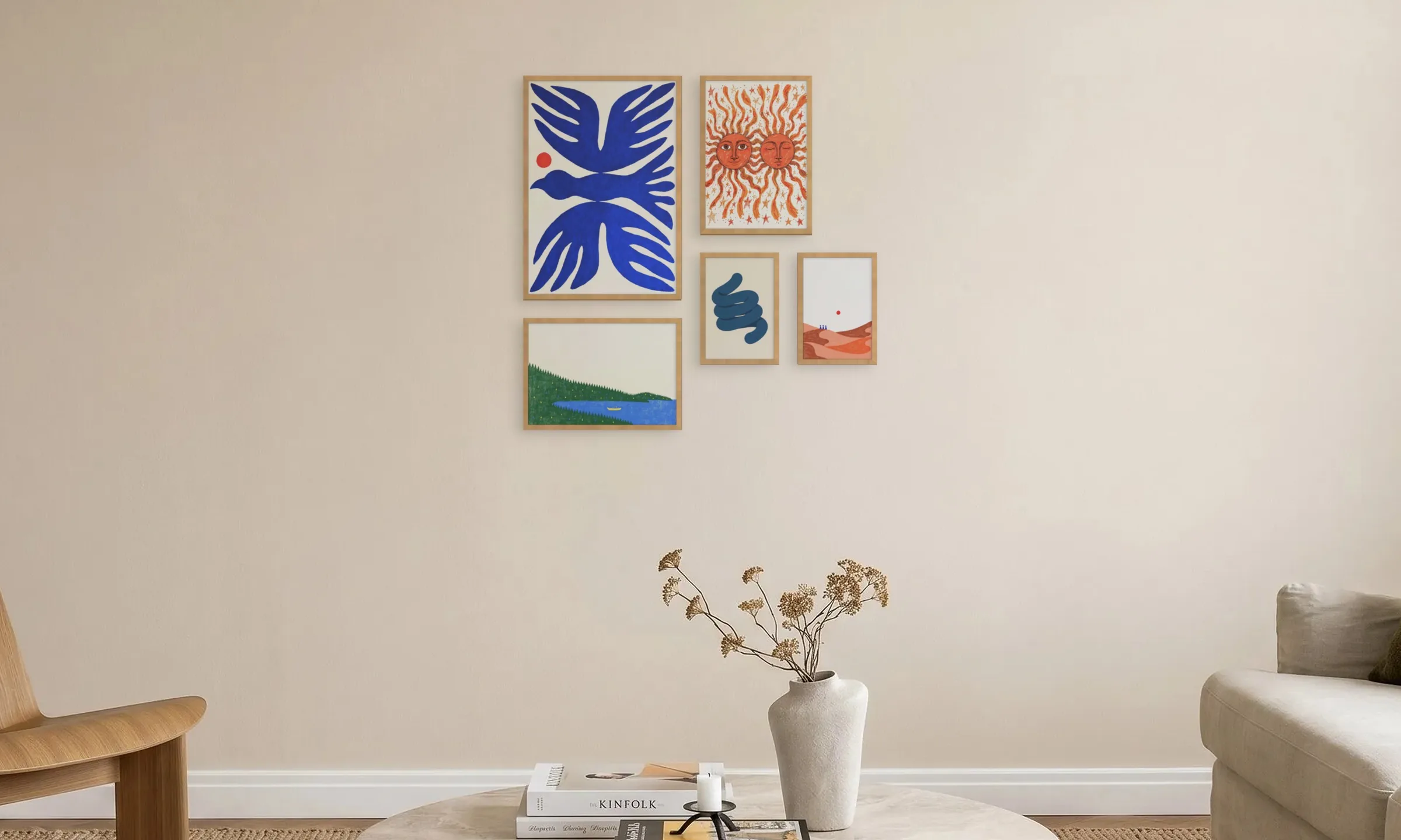 Five colourful prints in oak frames above a coffee table