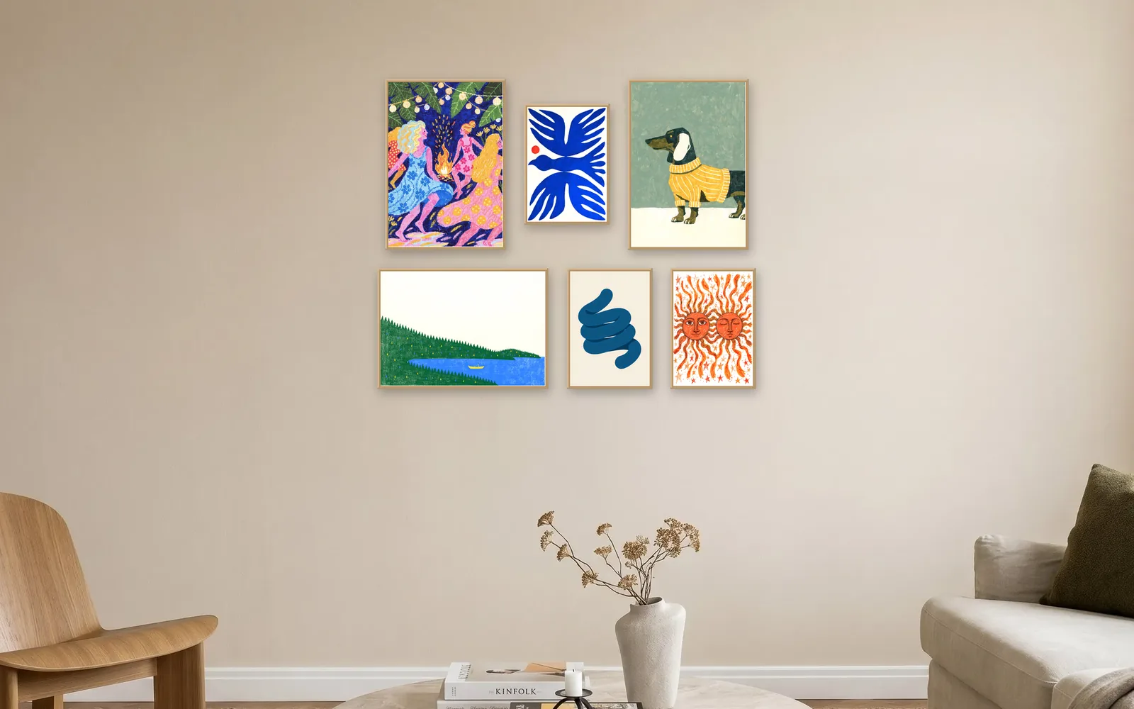 Salon gallery wall layout: six prints in oak frames, mixed sizes, on a living room wall