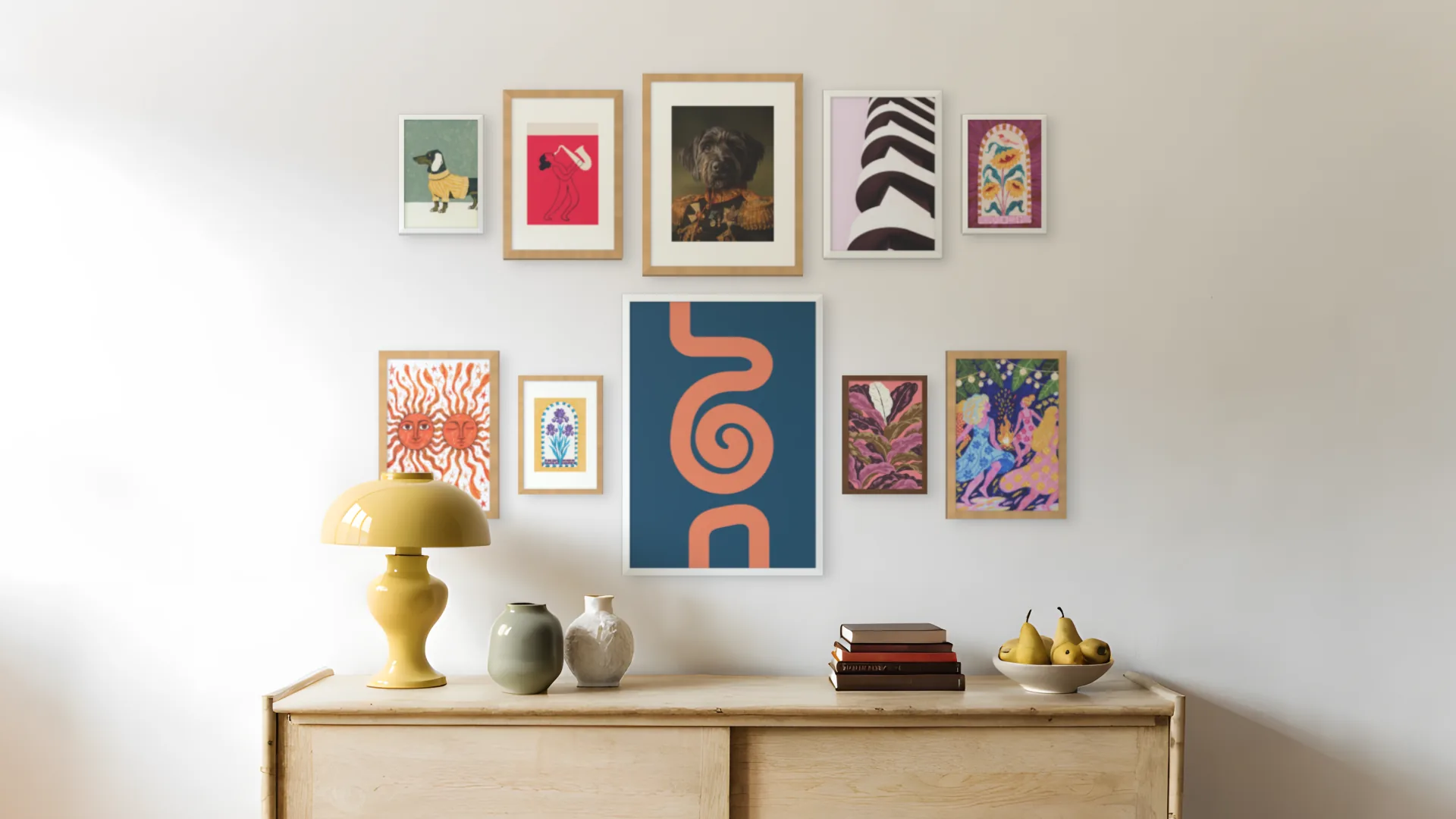 Bohemian gallery wall idea: ten framed prints in a grand salon arrangement above a sideboard in a living room.