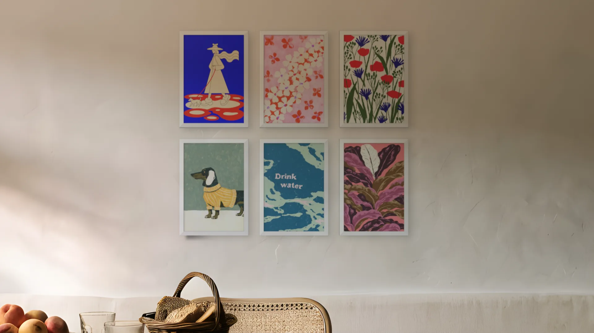 Kitchen gallery wall idea: six prints in white frames in a two by three grid above a bench in a kitchen-diner.