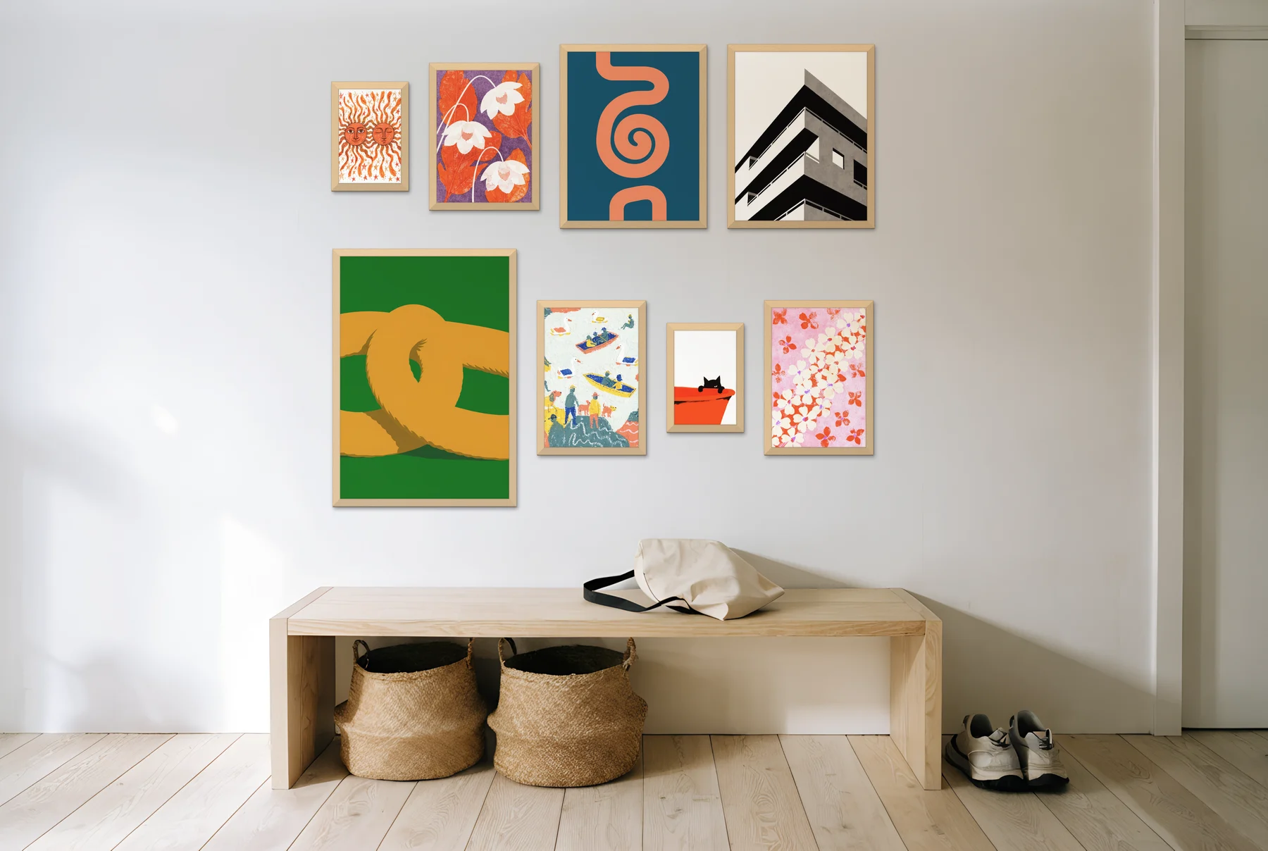 An asymmetric mix of eight frames above a hallway bench