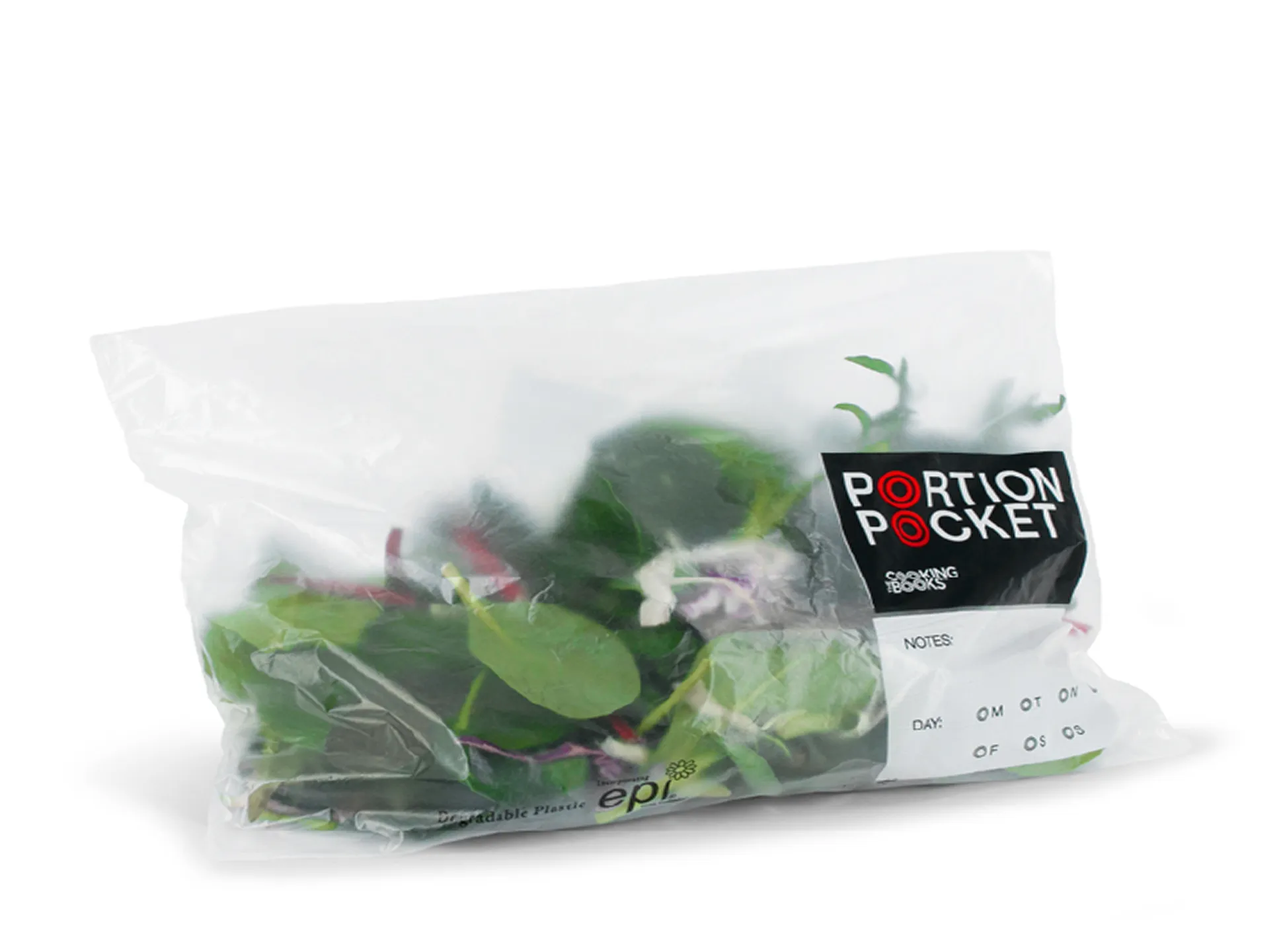 Clear plastic bag labeled Portion Pocket containing fresh green leafy salad mix.