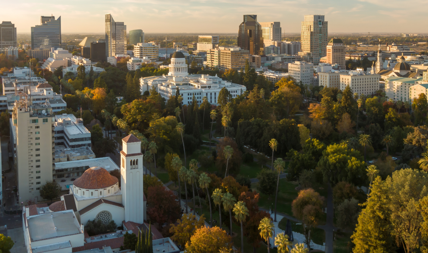 Aerial view of Sacramento, CA, showcasing the California State Capitol building amidst city parks and skyscrapers stock image