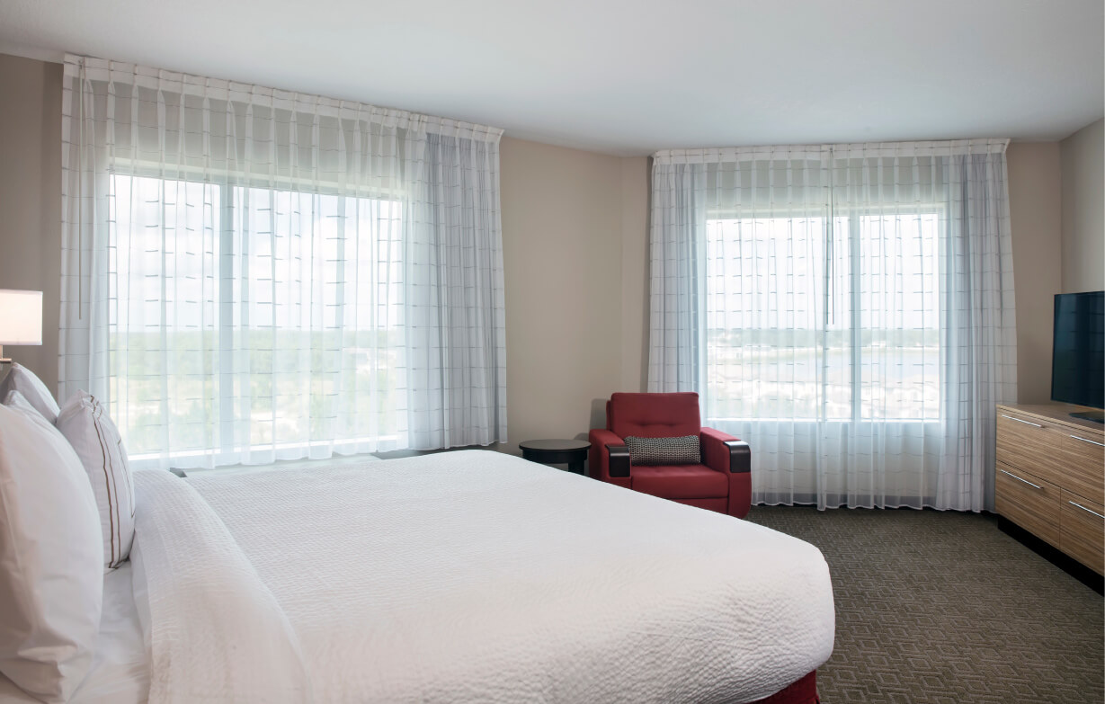 bedroom with windows