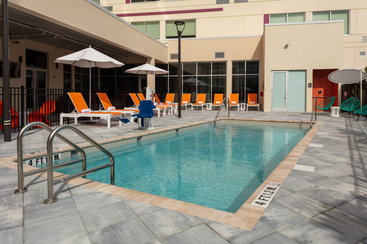 outdoor pool area with seating