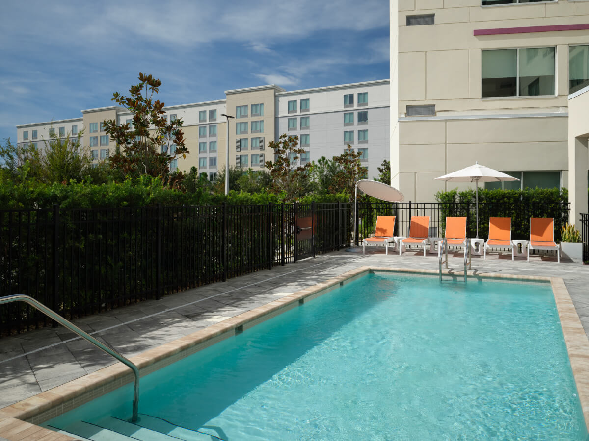 outdoor pool lit with sun
