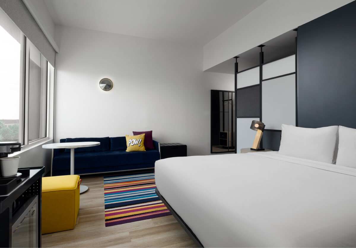 king bed hotel room with view