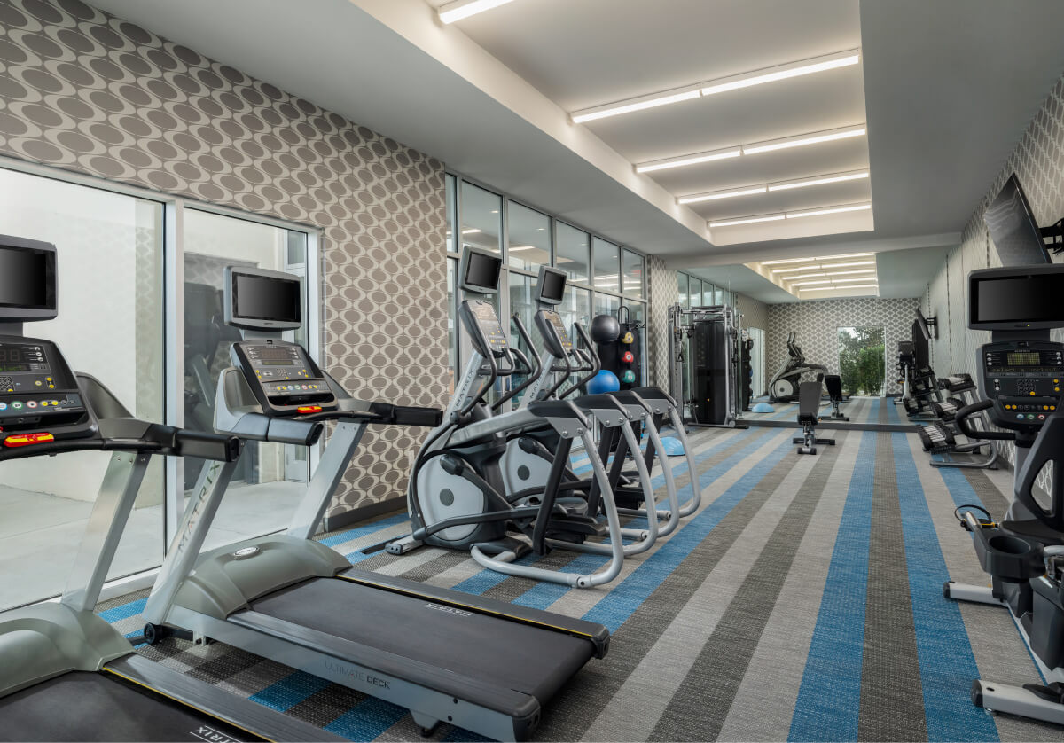 fitness center with treadmills