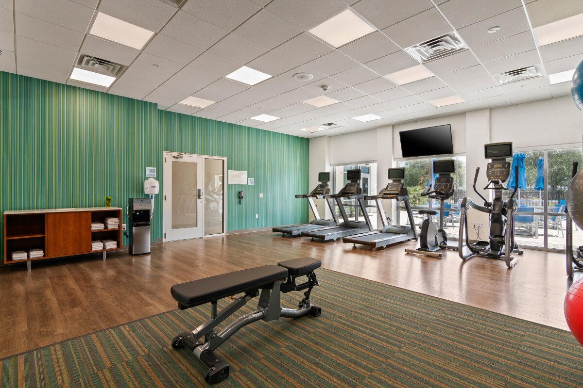 fitness room with treadmills