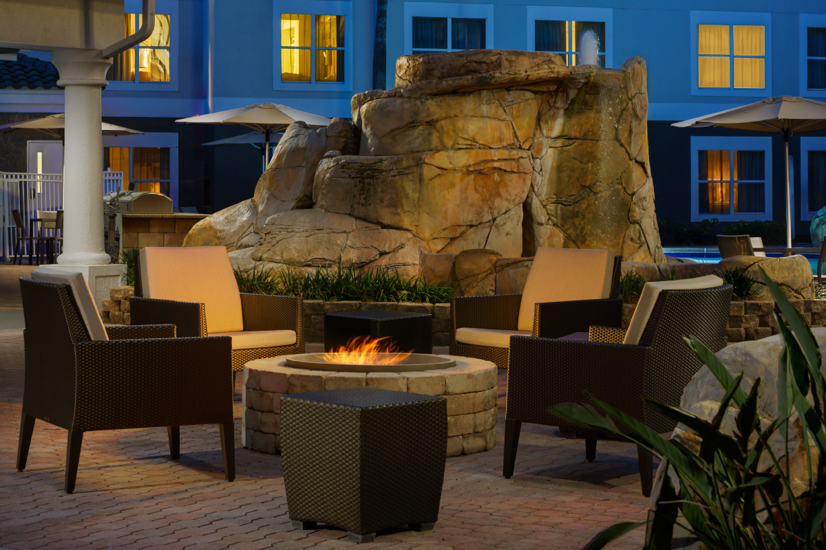 fire pit with stone in hotel courtyard