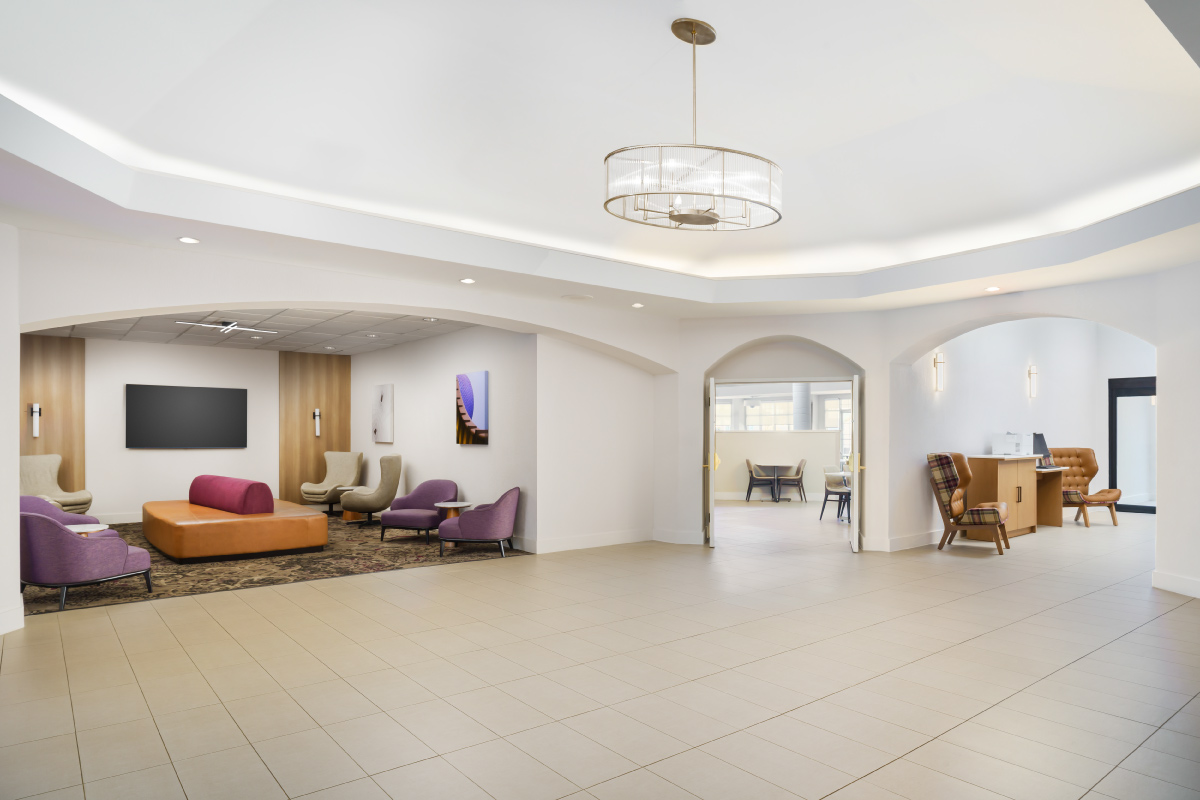 hotel lobby and seating with multiple rooms
