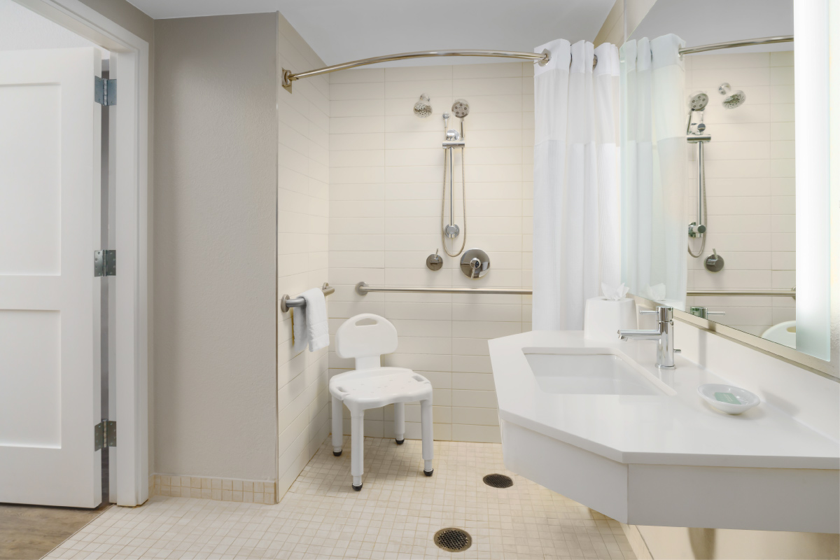 large accessible bathroom with shower