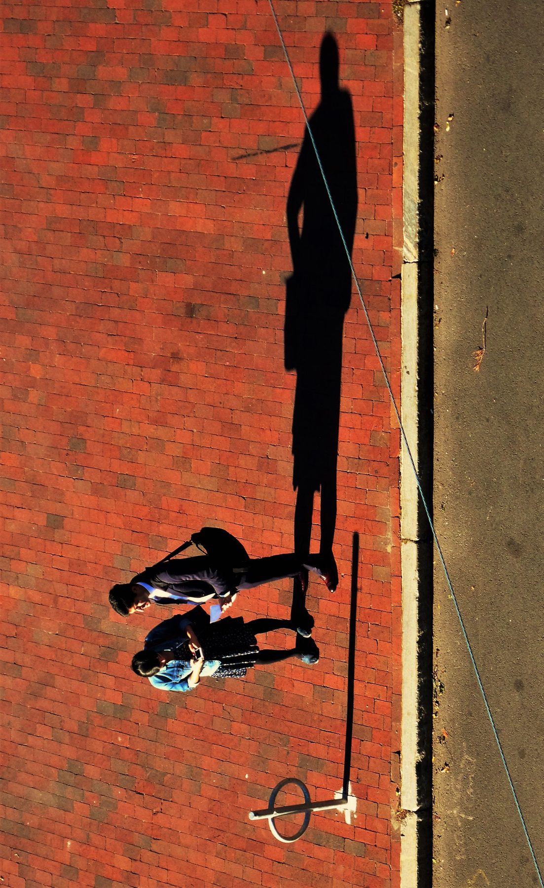 Couple with 1 shadow