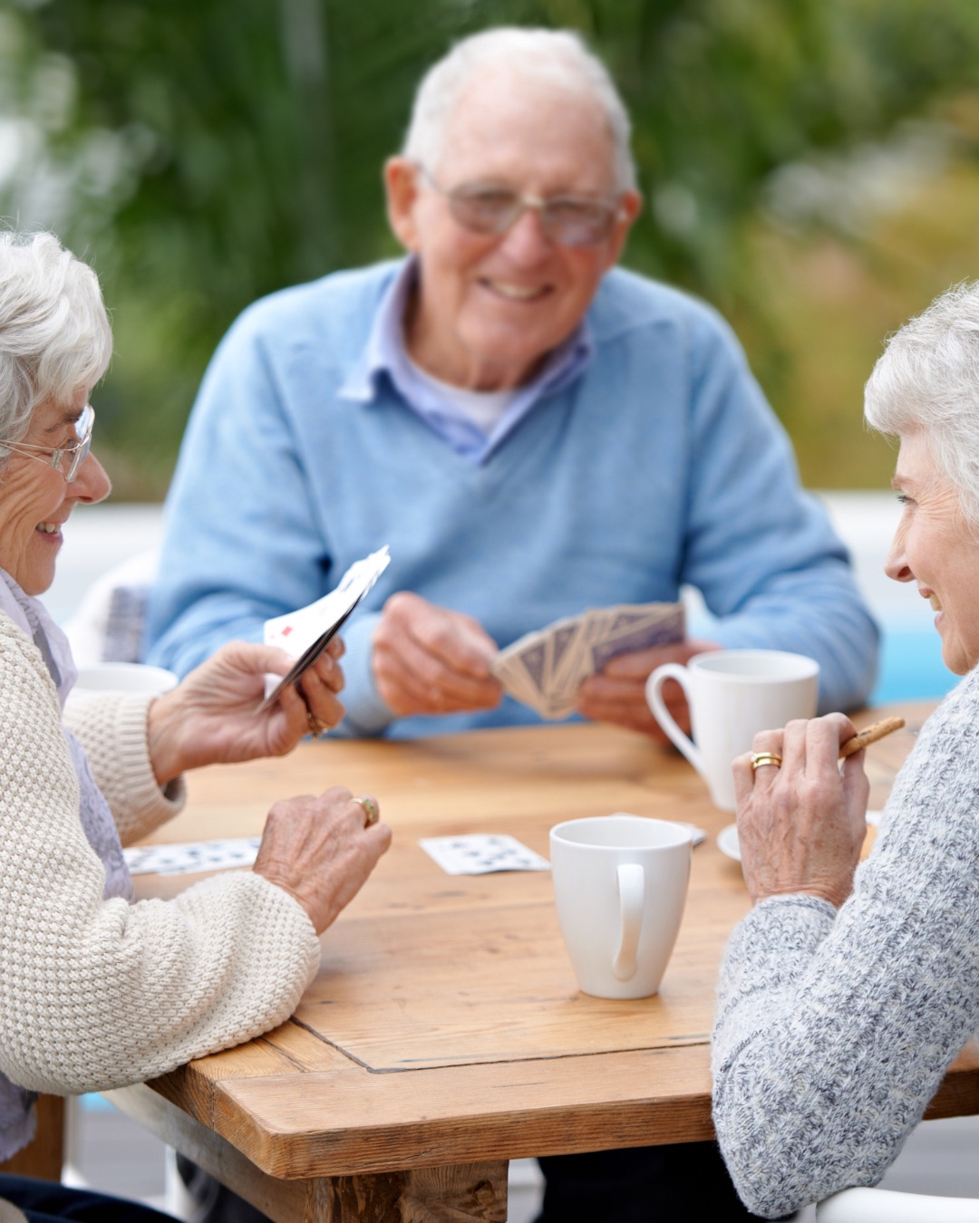 Residents enjoying a card game together
