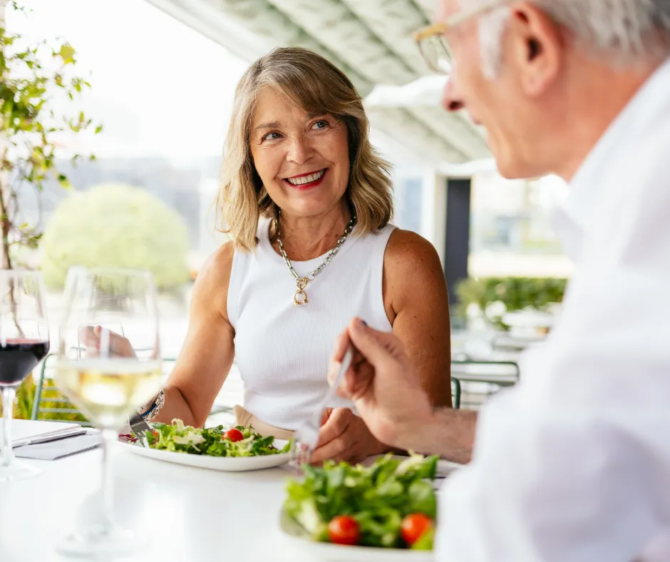 Residents enjoying lunch together outdoors