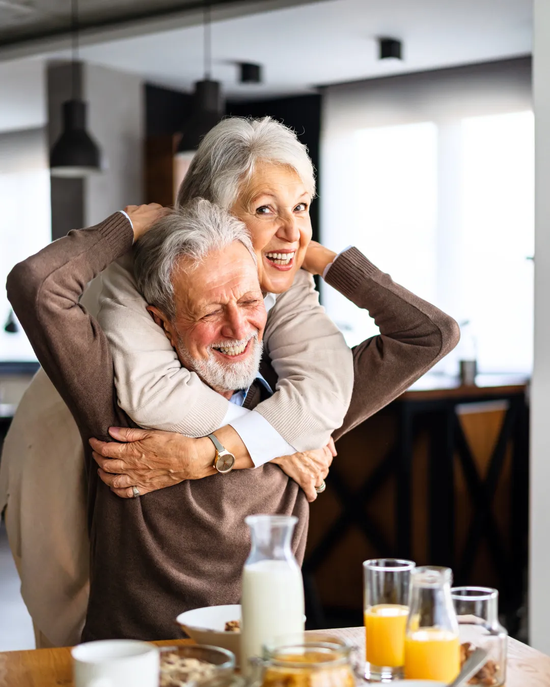 Independent living couple sharing breakfast
