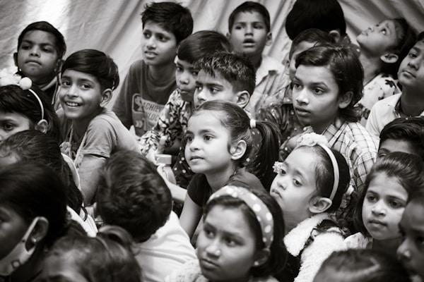 Indian students are attending an event. A group of Indian Kids attends a gathering—a group of Indian kids.