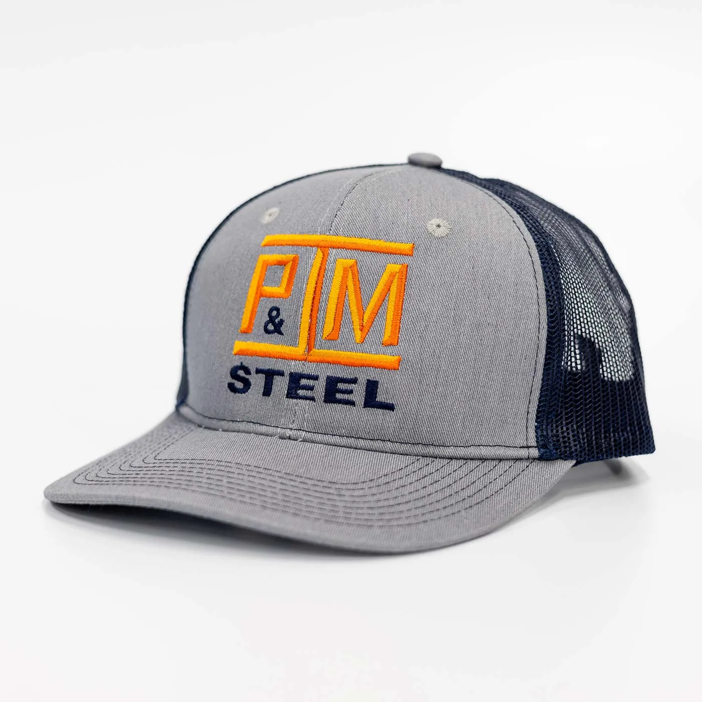 Gray and navy blue mesh trucker hat with an orange and black embroidered logo reading 'P&M STEEL' on the front.