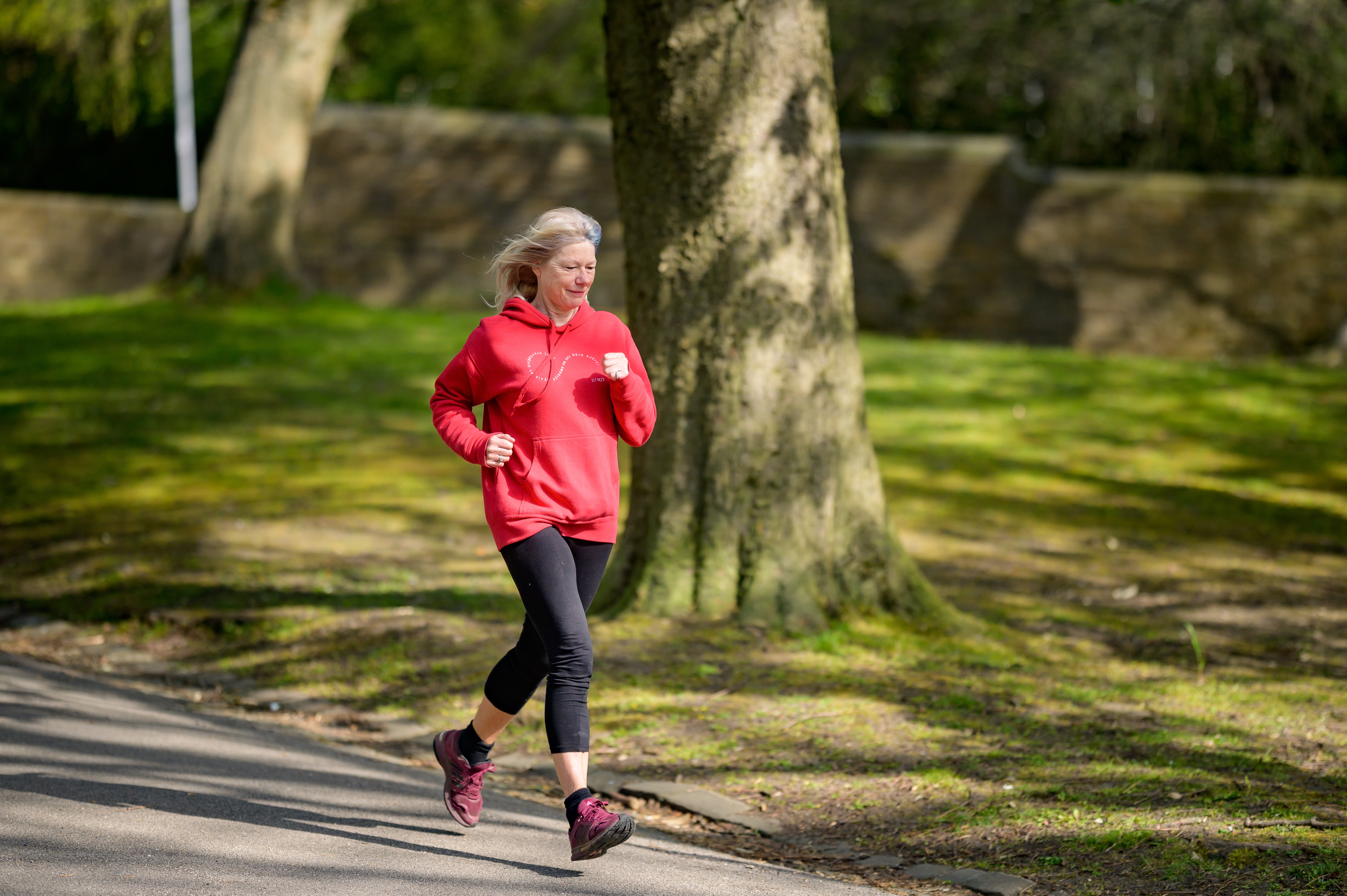 woman running stock image