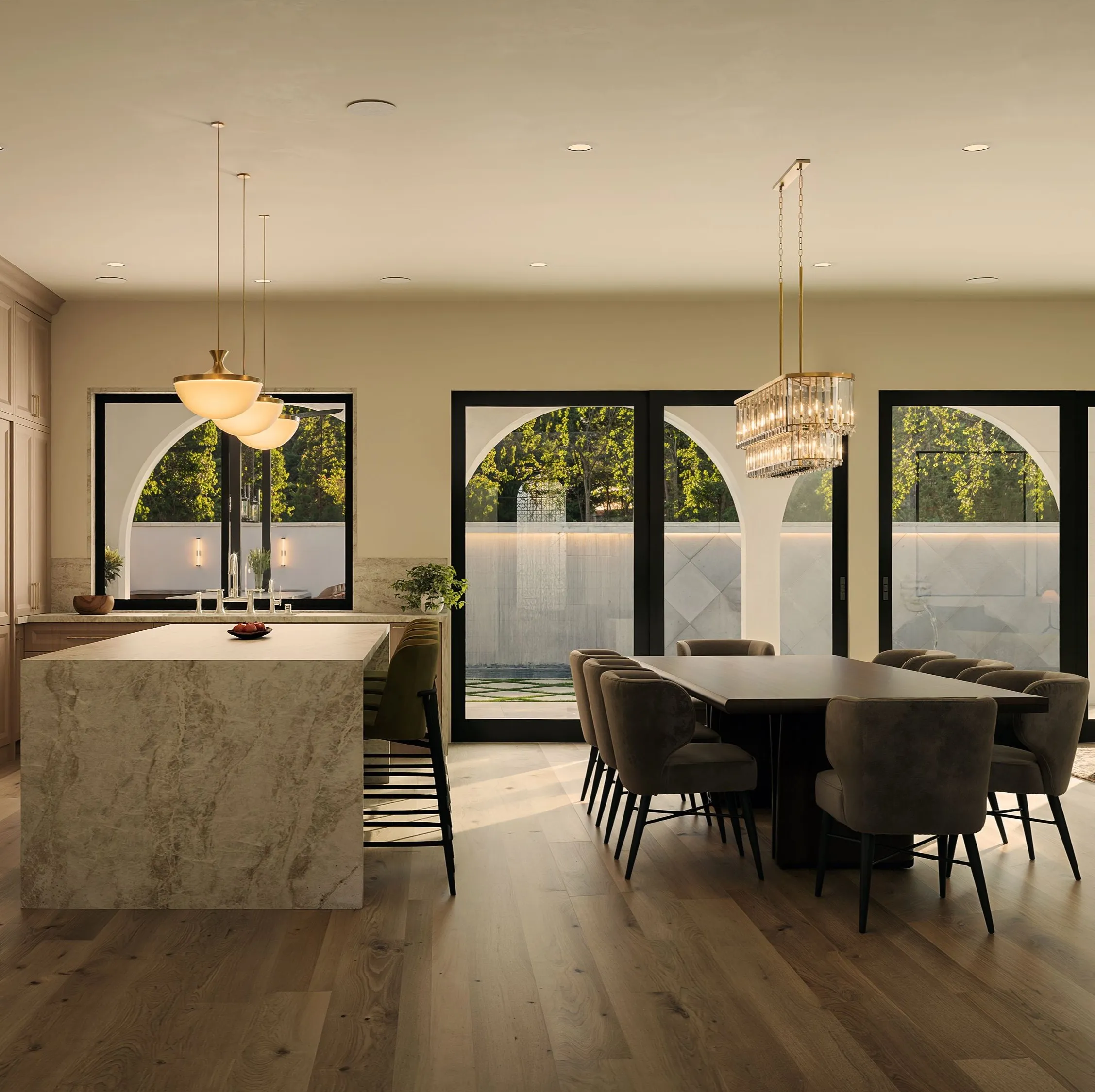 Bluesage modern Spanish estate great room with arched openings and warm interiors