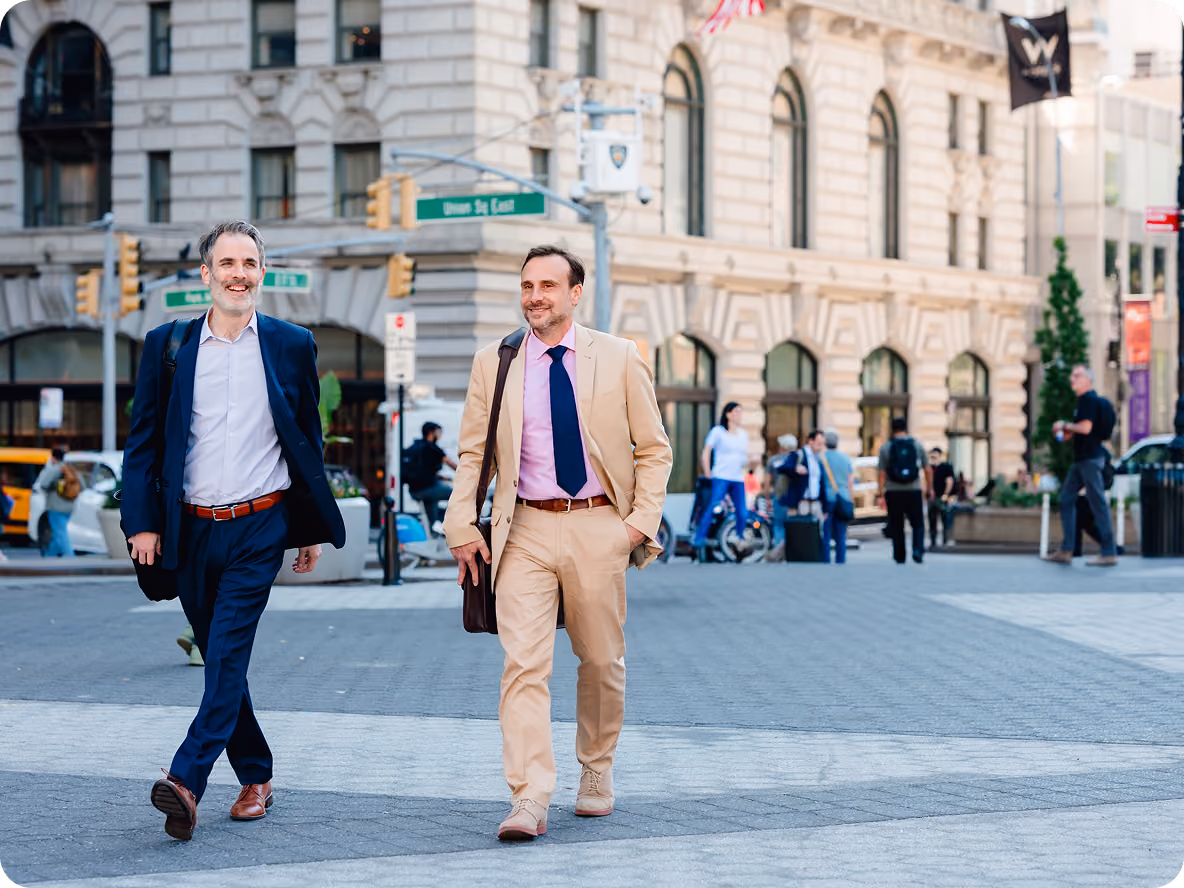 Brian Kohn & Ian Dumain walking near their law offices in Manhattan