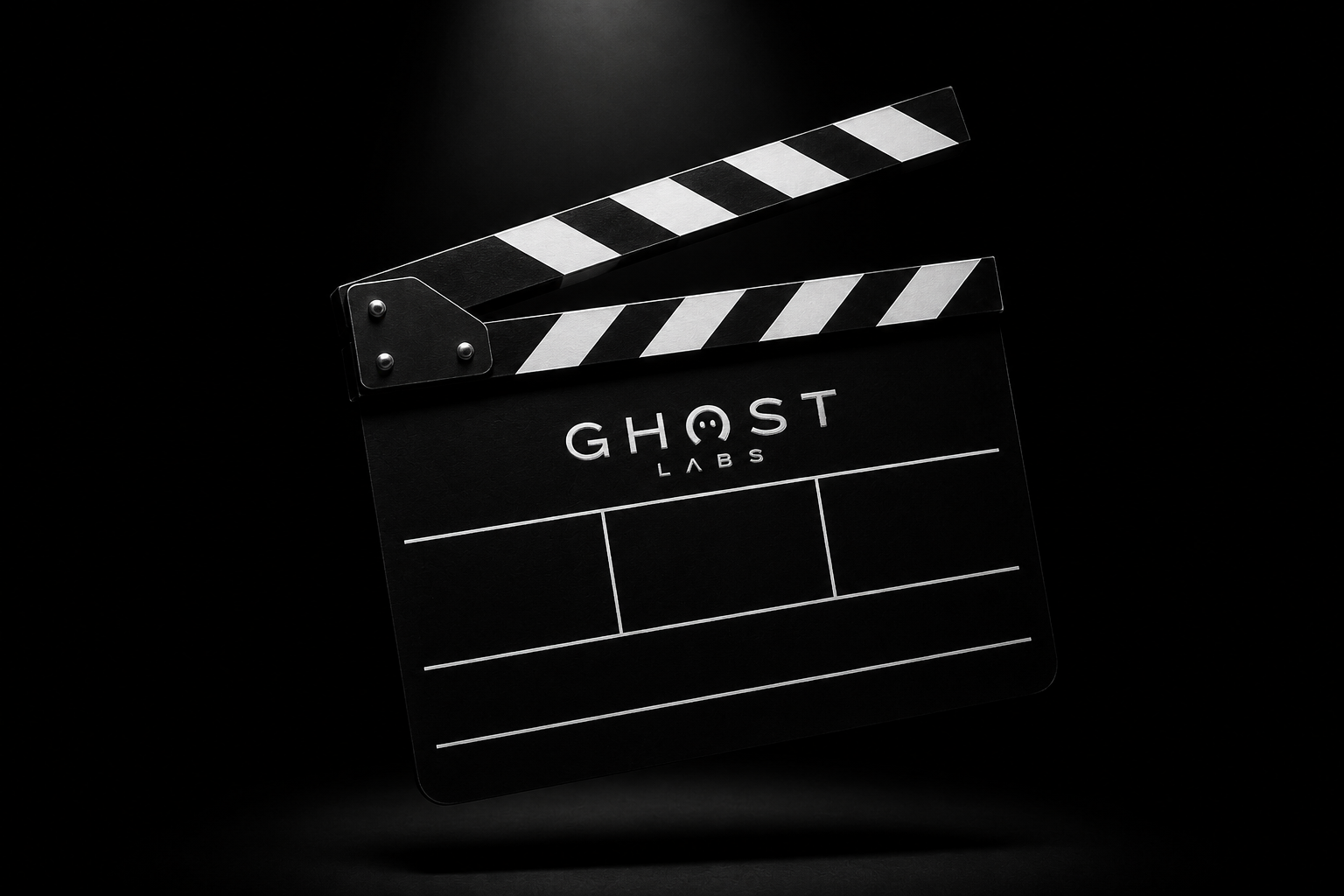 Black and white film clapperboard with GHOST LABS logo on a dark background.