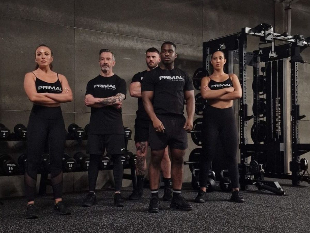 Primal Strength talent lined up in the gym for the brand content shoot