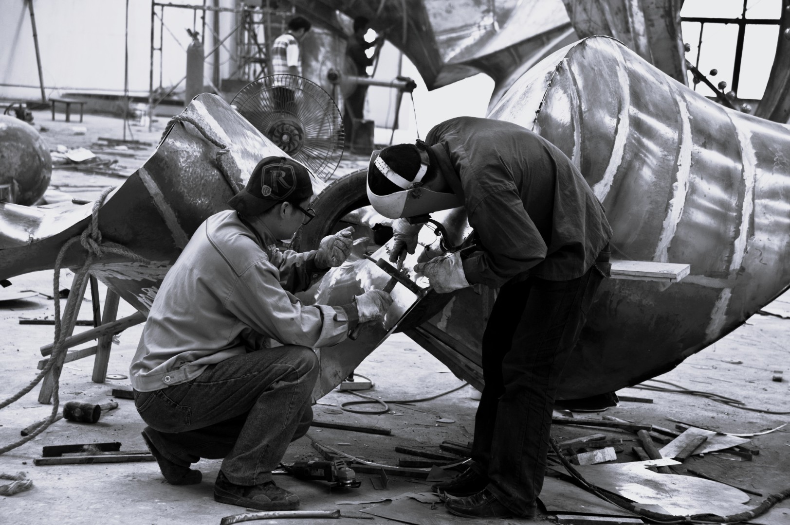Fabrication team working on the curved structure of Bridge of Winds.
