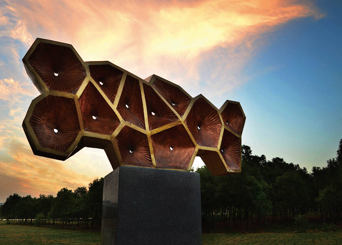 Garden by Li Ziqing, an open cellular sculpture against the evening sky.