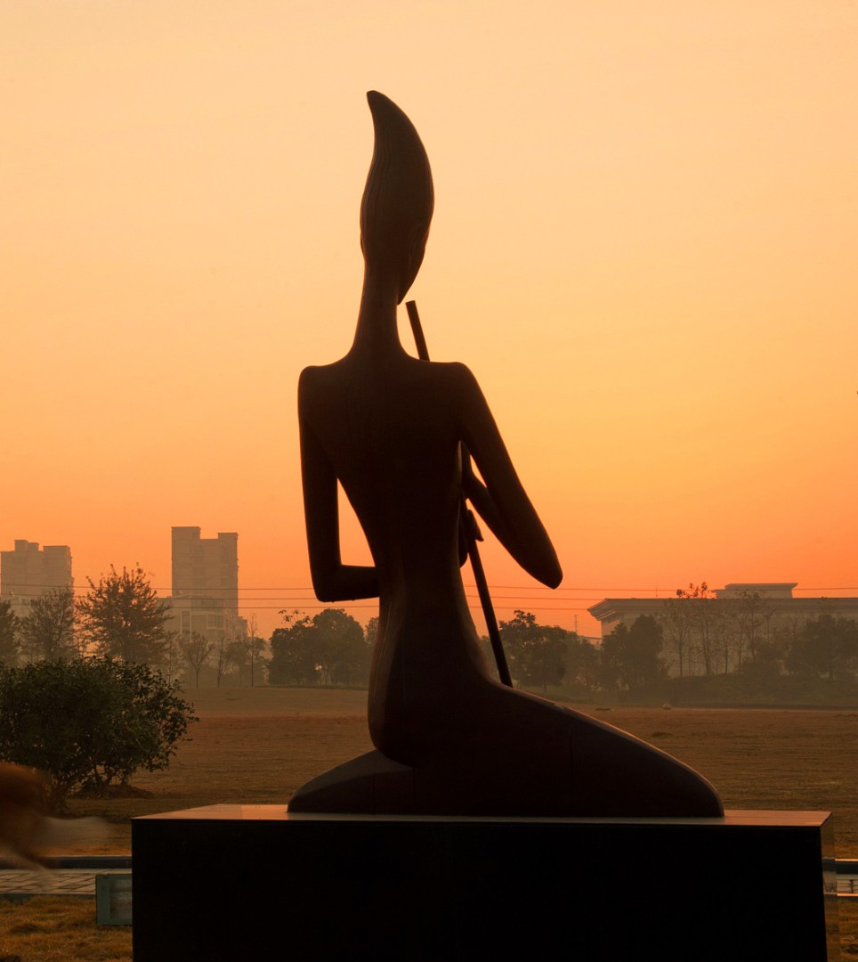 Silhouette of Song of Wind Flute against the evening sky.